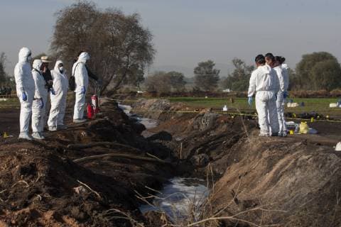 January 19, 2019 - Tlahuelipan, Hidalgo, MEXICO - Saturday, January 19, 2019. Experts from the General Prosecutor Office of Mexico are working on the recovery and identification of bodies in the area where yesterday a Pemex pipeline exploded by a clandestine taking of the gasoline by of huachicoleros that went out of control and left 67 dead, so far, in the San Primitivo community, municipality of Tlahuelilpan, Hidalgo. ANTONIO NAVA PI Tlahuelipan MEXICO - ZUMAp124 20190119_zaa_p124_027 Copyright: xAntonioxNavax