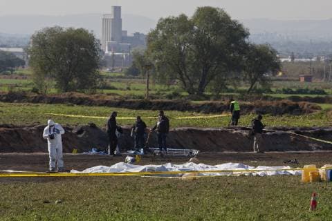 January 19, 2019 - Tlahuelipan, Hidalgo, MEXICO - Saturday, January 19, 2019. Experts from the General Prosecutor Office of Mexico are working on the recovery and identification of bodies in the area where yesterday a Pemex pipeline exploded by a clandestine taking of the gasoline by of huachicoleros that went out of control and left 67 dead, so far, in the San Primitivo community, municipality of Tlahuelilpan, Hidalgo. ANTONIO NAVA PI Tlahuelipan MEXICO - ZUMAp124 20190119_zaa_p124_029 Copyright: xAntonioxNavax