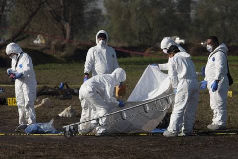 January 19, 2019 - Tlahuelipan, Hidalgo, MEXICO - Saturday, January 19, 2019. Experts from the General Prosecutor Office of Mexico are working on the recovery and identification of bodies in the area where yesterday a Pemex pipeline exploded by a clandestine taking of the gasoline by of huachicoleros that went out of control and left 67 dead, so far, in the San Primitivo community, municipality of Tlahuelilpan, Hidalgo. ANTONIO NAVA PI Tlahuelipan MEXICO - ZUMAp124 20190119_zaa_p124_026 Copyright: xAntonioxNavax