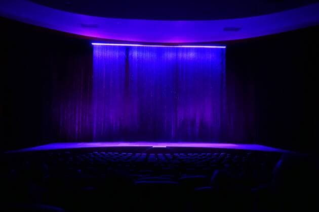 27 12 2018 Berlin GER cinema hall in zoo palace Berlin blue German Germany dark darkness Europe European film theatre closed society inside interior shot cinema empty empty canvas cinema cinema cinema purple QF landscape format velvet curtain theatre purple curtain Western Europe economy zoo palace closed spectator recession 181227D052BERLIN JPG