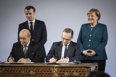 Jean Yves Le Drian VL Foreign Minister of France Federal Minister of Foreign Affairs Heiko Maas VR SPD President of France Emmanuel Macron HL and Chancellor Angela Merkel HR CDU accepted at the signing of the Treaty between the Federal Republic of Germany and the French Republic on Cooperation and Integration Treaty of Aachen in Aachen 22 01 2019 Aachen Germany Copyright: xFlorianxGaertner photothek.netx
