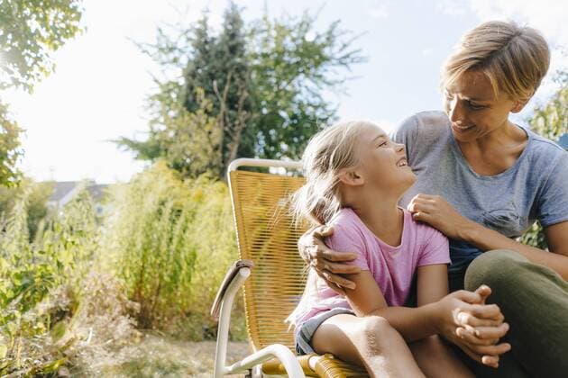 Mother and daughter having fun in garden model released Symbolfoto property released  KNSF05105