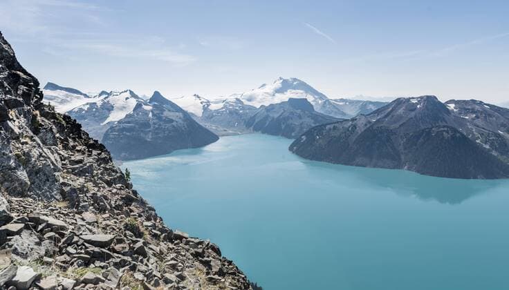 Turquoise Glacial Lake Garibaldi Lake in front of mountain range with snow and glacier Mt Garibaldi Garibaldi Provincial Park British Columbia Canada North America Copyright: imageBROKER/MoritzxWolf ibxmmw04824616.jpg