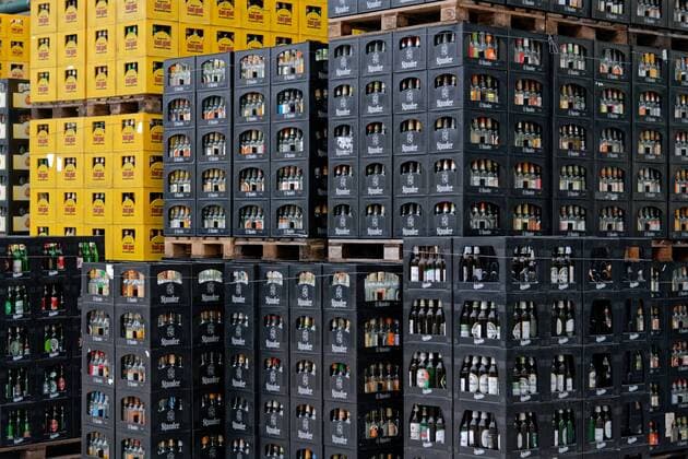 New reusable systems for the beverage market Federal Environment Minister Svenja Schulze visited the Essen private brewery Jacob Stauder GmbH Co KG to find out more about modern reusable systems for beverages The minister visited the Essen brewery as part of the anti-disposal campaign initiated by the Federal Environment Ministry BMU The picture shows beer crates stacked with foreign bottles on t