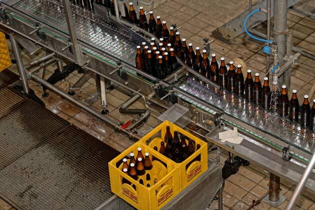 New reusable systems for the beverage market Federal Environment Minister Svenja Schulze visited the Essen private brewery Jacob Stauder GmbH Co KG to find out about modern reusable systems for beverages The Ministers visit was part of the anti-disposal campaign initiated by the Federal Environment Ministry (BMU) In the picture, beer bottles after bottling Essen North Rhine-Westphalia Germany