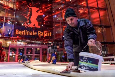 Laying of the red carpet which was produced this year in an environmentally friendly way in front of the Berlinale Palast at Potsdamer Platz on the occasion of the 69th International Film Festival Berlin snapshot photography F Boillot