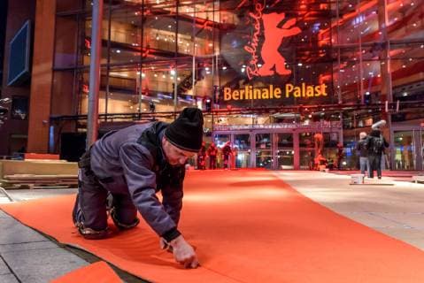 Laying of the red carpet which was produced this year in an environmentally friendly way in front of the Berlinale Palast at Potsdamer Platz on the occasion of the 69th International Film Festival Berlin snapshot photography F Boillot
