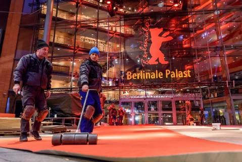 Laying of the red carpet which was produced this year in an environmentally friendly way in front of the Berlinale Palast at Potsdamer Platz on the occasion of the 69th International Film Festival Berlin snapshot photography F Boillot