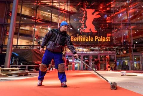 Laying of the red carpet which was produced this year in an environmentally friendly way in front of the Berlinale Palast at Potsdamer Platz on the occasion of the 69th International Film Festival Berlin snapshot photography F Boillot