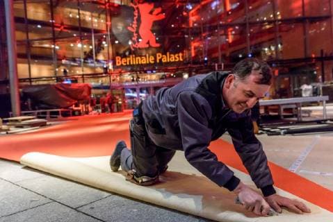 Laying of the red carpet which was produced this year in an environmentally friendly way in front of the Berlinale Palast at Potsdamer Platz on the occasion of the 69th International Film Festival Berlin snapshot photography F Boillot