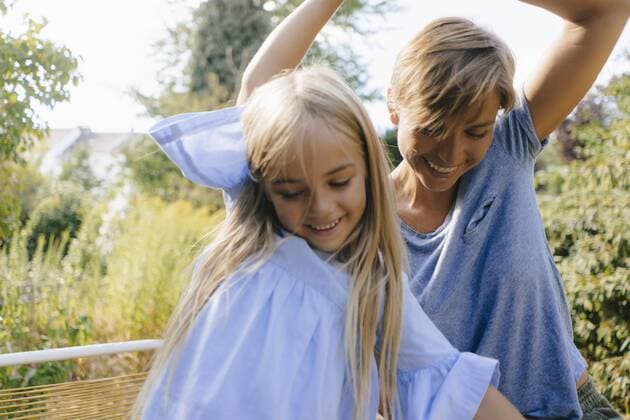 Mother and daughter having fun in garden model released Symbolfoto property released  KNSF05093