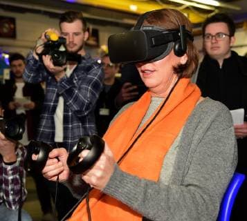 NRW Minister of Education Yvonne Gebauer visits the School Lab of the German Aerospace Center on 06 02 2019 DLR Minister Yvonne Gebauer is on a virtual reality tour of the International Space Station with the Oculus Lift VR glasses she sees the space station three-dimensional Â
