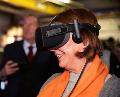 NRW Minister of Education Yvonne Gebauer visits the School Lab of the German Aerospace Center on 06 02 2019 DLR Minister Yvonne Gebauer is on a virtual reality tour of the International Space Station with the Oculus Lift VR glasses she sees the space station three-dimensional Â