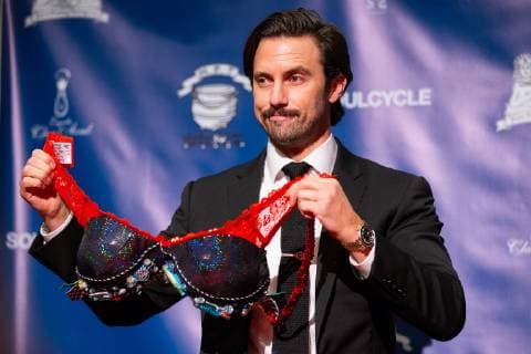 Actor Milo Ventimiglia holds up a bra he received while being honored as the Harvard University Hasty Pudding Theatricals 2019 Man of the Year at Harvard University in Cambridge, Massachusetts on February 8, 2019.  BOS20190208104 MATTHEWxHEALEY