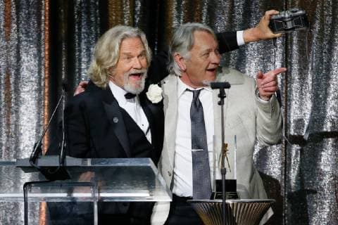 ASC Board of Governors Award honoree Jeff Bridges, left, uses a Widelux panoramic camera to take a photo himself and his stand in and stunt double presenter Loyd Catlett after accepting his award at the 33rd annual ASC Awards and The American Society of Cinematographers 100th Anniversary Celebration at the Ray Dolby Ballroom at Hollywood & Highland, Saturday, February 9, 2019 in Hollywood, California. Photo by Danny Moloshok Moloshok Photography, Inc. imageSPACE MediaPunch Copyright: ximageSPACEx