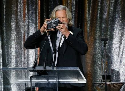 ASC Board of Governors Award honoree Jeff Bridges uses a Widelux panoramic camera to take a photo of the crowd as he accepts his award at the 33rd annual ASC Awards and The American Society of Cinematographers 100th Anniversary Celebration at the Ray Dolby Ballroom at Hollywood & Highland, Saturday, February 9, 2019 in Hollywood, California. Photo by Danny Moloshok Moloshok Photography, Inc. imageSPACE MediaPunch Copyright: ximageSPACEx