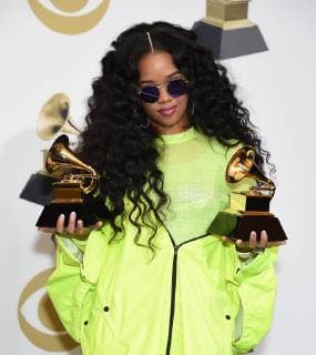 H.E.R. appears backstage with her awards for Best R&B Performance for Best Part, and Best R&B Album for H.E.R., during the 61st annual Grammy Awards held at Staples Center in Los Angeles on February 10, 2019.  LAP201902101044 GREGGxDEGUIRE