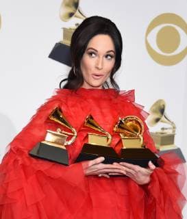 Kacey Musgraves appears backstage with her awards for Best Country Solo Performance for Butterflies, Best Country Song for Space Cowboy, Best Country Album for Golden Hour, and Album of The Year for Golden Hour, during the 61st annual Grammy Awards held at Staples Center in Los Angeles on February 10, 2019.  LAP201902101051 GREGGxDEGUIRE