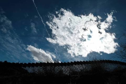 February 16, 2019 - Nogales, Arizona, U.S - U.S. army engineers added several more rows of barbed wire to the border wall that seperates Nogales, Arizona from Nogales, Sonora Mexico. President Trump sent several thousand U.S troops to the border who added two rows of concertina wire to the top of the border fence on election day. Last week the soldiers added four additional rows to the outrage of the Nogales Mayor Arturo Garino and the city council . They claim there is no border crisis and the wire at ground level threatens public safety and is bad for business and tourism. They claim it is is a manufactured crisis and that Nogales is a very safe city . The mayor demanded the barbed wire be removed Nogales U.S. - ZUMAb411 20190216_zap_b411_001 Copyright: xChristopherxBrownx