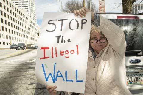 February 18, 2019 - Atlanta, GA, U.S - One hundred demonstrators gathered at the Atlanta field office of U.S. Immigration and Customs Enforcement to protest againt President Trump s declaration of a national emergency in order to fund a wall along the U.S. Mexico border. The protest was part of a nationwide series of protests organized by MoveOn.org, and was locally supported by organizations such as the Georgia Alliance for Social Justice, the ACLU, and Project South. Atlanta U.S. - ZUMAe86_ 20190218_zap_e86_022 Copyright: xStevexEberhardtx
