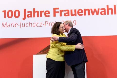 The SPD Bundestag faction celebrates 100 years of womens suffrage Germany Berlin 18 02 2019 Event of the SPD Bundestag faction on 100 years of womens suffrage - Our goal is parity and awarding of the Marie Juchacz Prize 2019 In the picture Wilhelm Schmidt President of Arbeiterwohlfahrt e V AWO and Andrea Nahles Chairwoman of the SPD Bundestag faction hug each other Federal Minister