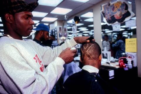 Discrimination based on hair illegal Patrons of the The Buzz haircutters in Greenwich Village get their styled with Malcolm X motifs on November 21, 1992. Spike Lee s movie Malcolm X had just opened. The NYC Commission on Human Rights has ruled that discrimination based on race, gender, religion, etc. applies to hair, which by extension is intrinsic to black identity. (  RICHARDxB.xLEVINE