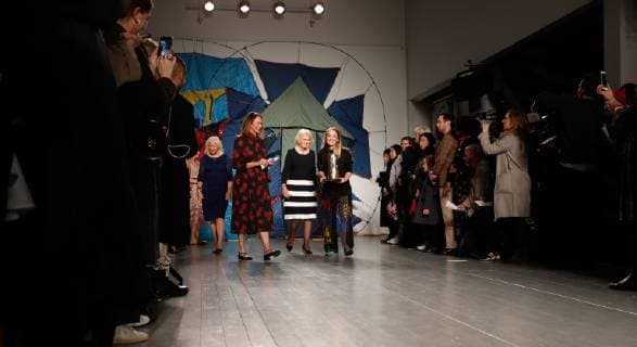 February 19, 2019 - London, United Kingdom - HRH Duchess of Cornwall Camilla presents Elizabeth II Award for young talents in fashion to the winner Bethany Williams (from left Caroline Rush, HRH Duchess of Cornwall, Bethany Williams) during London Fashion Week February 2019 at the BFC show space on February 19, 2019 in London, England. London United Kingdom  - ZUMAn230 20190219_zaa_n230_870 Copyright: xDominikaxZarzyckax