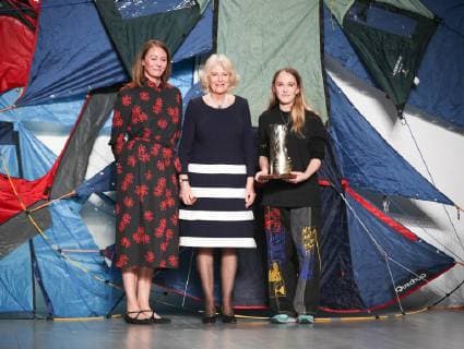 February 19, 2019 - London, United Kingdom - HRH Duchess of Cornwall Camilla presents Elizabeth II Award for young talents in fashion to the winner Bethany Williams (from left Caroline Rush, HRH Duchess of Cornwall, Bethany Williams) during London Fashion Week February 2019 at the BFC show space on February 19, 2019 in London, England. London United Kingdom  - ZUMAn230 20190219_zaa_n230_860 Copyright: xDominikaxZarzyckax