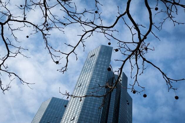 xmhx v l Deutsche Bank towers in Frankfurt am Main behind branches Frankfurt am Main