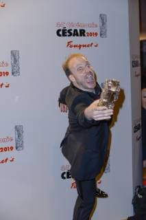 February 23, 2019 - Paris, Ile de France, France - Remi Allier with the Best Short Movie award for Les Petites Mains poses in the Fouquet s restaurant after the 44th Cesar Awards Ceremony at Salle Pleyel. Paris France - ZUMAs197 20190223_zaa_s197_048 Copyright: xThierryxLexFouillex