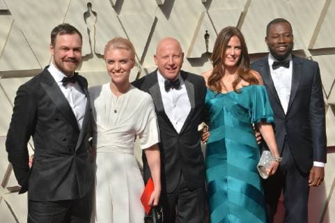 From left to right, Ed Perkins and guest, Jonathan Chinn and guest, and Cornelius Walker arrive on the red carpet for the 91st annual Academy Awards at the Dolby Theatre in the Hollywood section of Los Angeles on February 24, 2019.  LAP20190224033 JIMxRUYMEN