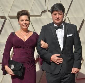 Nina Hartstone (L) and Kevin Kolovich arrive on the red carpet for the 91st annual Academy Awards at the Dolby Theatre in the Hollywood section of Los Angeles on February 24, 2019.  LAP20190224025 JIMxRUYMEN