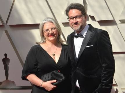 John Casali (R) and Anita Casali arrive on the red carpet for the 91st annual Academy Awards at the Dolby Theatre in the Hollywood section of Los Angeles on February 24, 2019.  LAP20190224024 JIMxRUYMEN