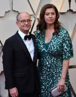 Ed Guiney (L) and guest arrive on the red carpet for the 91st annual Academy Awards at the Dolby Theatre in the Hollywood section of Los Angeles on February 24, 2019.  LAP20190224254 JIMxRUYMEN