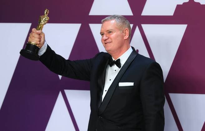 (190225) -- LOS ANGELES, Feb. 25, 2019 (Xinhua) -- John Ottman poses for photos after winning the Best Film Editing award for Bohemian Rhapsody in the press room during the 91st Academy Awards ceremony, or the Oscars, held at the Dolby Theatre in Los Angeles, the United States, on Feb. 24, 2019. (Xinhua Li Ying) U.S.-LOS ANGELES-OSCARS-BEST FILM EDITING 