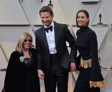 (L-R) Gloria Campano, Bradley Cooper, and Irina Shayk arrive on the red carpet for the 91st annual Academy Awards at the Dolby Theatre in the Hollywood section of Los Angeles on February 24, 2019.  LAP201902240253 JIMxRUYMEN