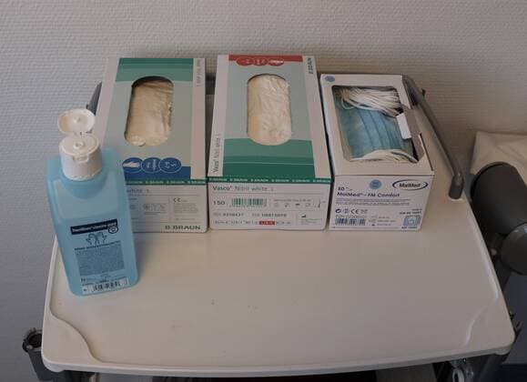 Hygiene Cleanliness Disinfectants Disinfectants Mouthguards Protective gloves Protective clothing Information sign in a hospital with the words Protective measures with mouth Noses Protection photographed on 25 02 2019 Â