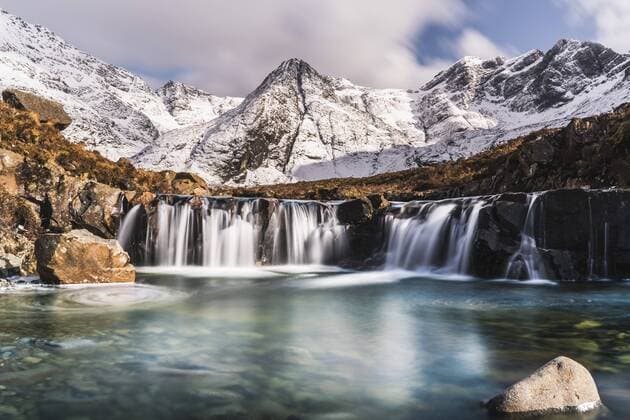 Cascades beneath the snow-covered Black Cuillin, Fairy Pools, Glen Brittle, Isle of Skye, Inner Hebrides, Highland, Scotland, United Kingdom, Europe Copyright: StephenxTomlinson 1309-6