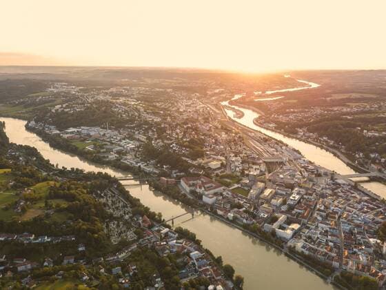 Germany, Bavaria, Passau, City of three rivers, Aerial view, Danube and Inn river, Veste Oberhaus and Maria Hilf at sunset  JUNF01569