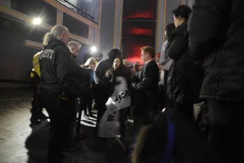 March 4, 2019 - Toronto, Ontario, Canada - A protester being carried away after she was yelling and questioning Prime Minister Justin Trudeau and leader of the Liberal Party of Canada, during a Liberal Climate Action Rally in Toronto, ON, on March 4, 2019. Toronto Canada  - ZUMAn230 20190304_zaa_n230_686 Copyright: xArindamxShivaanix