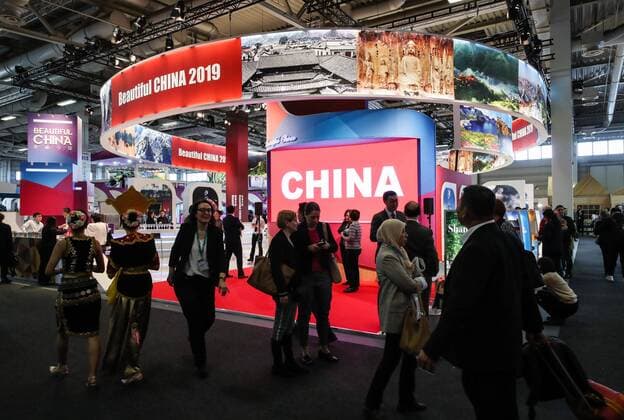 (190306) -- BERLIN, March 6, 2019 (Xinhua) -- People visit the booth of China during the ITB Berlin travel trade show in Berlin, capital of Germany, on March 6, 2019. The ITB Berlin travel trade show kicked off here on Wednesday, drawing around 10,000 exhibitors worldwide. A delegation from China representing several localities, tourism businesses and aviation companies will promote Chinese tourism brands at the ITB Berlin. (Xinhua Shan Yuqi) GERMANY-BERLIN-2019 ITB BERLIN-CHINA 