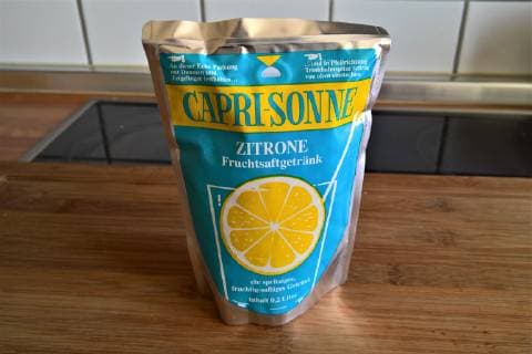 Capri Sun Capri Sun is a fruit juice beverage first launched in 1969 in orange and lemon flavours and sold in a 200 millilitre stand-up pouch with straw Certain Capri Sun varieties are now also available in 330ml pouches and cans The CapriSun brand is owned by Capri Sun Group Holding in Switzerland, privately owned by Hans Pet