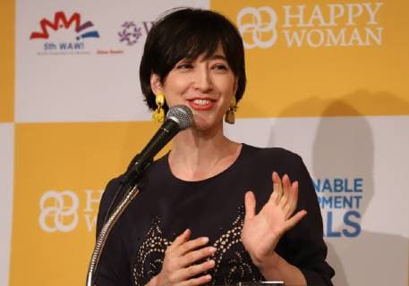 March 8, 2019, Tokyo, Japan - Japanese TV personality Christel Takigawa delivers a speech as she receives the Happy Woman Award 2019 for SDGs on the International Women s Day in Tokyo on Friday, March 8, 2019. Five women were awarded as they contributed to the promotion of gender equality and UN s SDGs.  (98742885)