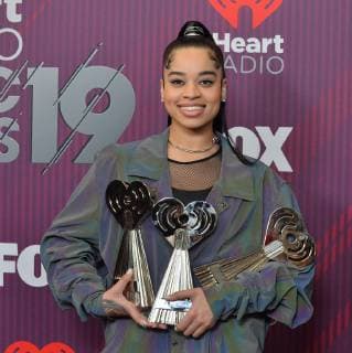 Ella Mai, wins the award for R&B Artist of the Year, Best New R&B Artist, and R&B Song of the Year for Boo d Up, , appears backstage during the sixth annual iHeartRadio Music Awards at the Microsoft Theater in Los Angeles, California on March 14, 2019. The annual award show will broadcast live on FOX.  LAP20190314146 JIMxRUYMEN