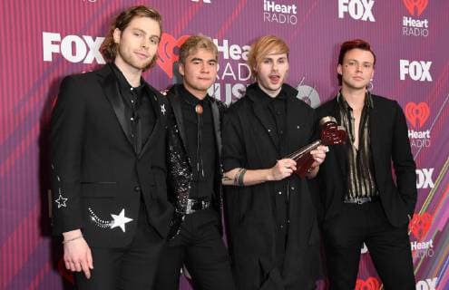 14 March 2019 - Los Angeles, California - 5 Seconds of Summer. 2019 iHeart Radio Music Awards - Press Room held at Microsoft Theater. Photo Credit: Birdie Thompson AdMedia 236453 2019-03-14 California Los Angeles Etats-Unis  Copyright: xAdMediax STAR_236453_101