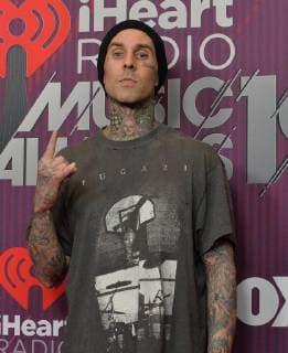 Travis Barker arrives for the sixth annual iHeartRadio Music Awards at the Microsoft Theater in Los Angeles, California on March 14, 2019. The annual award show will broadcast live on FOX.  LAP20190314475 JIMxRUYMEN