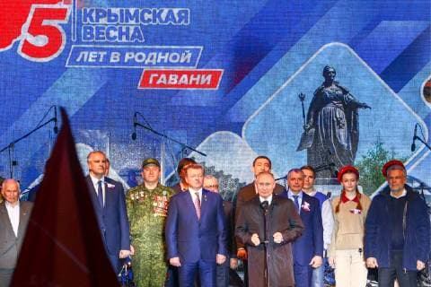 SEVASTOPOL, RUSSIA - MARCH 18, 2018: Russia s President Vladimir Putin (C front) attends a concert marking the 5th anniversary of the Crimean status referendum and its reunification with Russia in Sevastopol. Sergei Malgavko TASS  TS0A500A