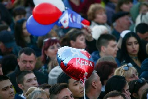 SEVASTOPOL, RUSSIA - MARCH 18, 2018: Citizens of Sevastopol attend a concert marking the 5th anniversary of the Crimean status referendum and its reunification with Russia. Sergei Malgavko TASS  TS0A5011