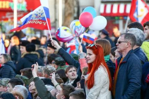SEVASTOPOL, RUSSIA - MARCH 18, 2018: Citizens of Sevastopol attend a concert marking the 5th anniversary of the Crimean status referendum and its reunification with Russia. Sergei Malgavko TASS  TS0A5015
