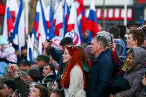 SEVASTOPOL, RUSSIA - MARCH 18, 2018: Citizens of Sevastopol attend a concert marking the 5th anniversary of the Crimean status referendum and its reunification with Russia. Sergei Malgavko TASS  TS0A5017